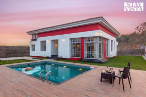StayVista's Rustique Radiance - Hillside Retreat with Outdoor Pool & South Indian Architecture